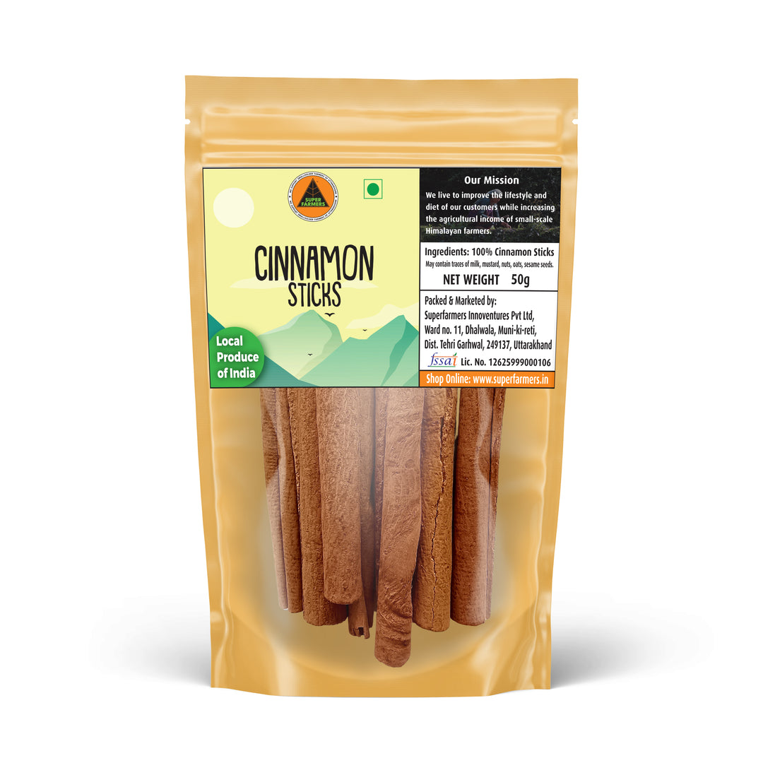 uperfarmers Cinnamon Sticks 50g stand-up pouch, showing whole cinnamon sticks through a clear window. The label indicates 'Local Produce of India'.